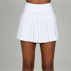 Gold hinge white skirt